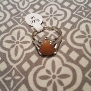 Tear drop shaped orange stone ring
